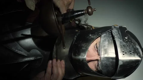 Vertical shot of medieval knight in dramatic pose. Video stock 142500636