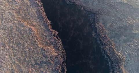 Vertical shot of mist blowing over cold river feature Stock Footage 93487058