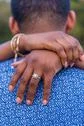 Vertical Shot Of A Newly Engaged African-American Couple Stock Photos