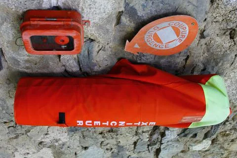 Vertical shot of objects with French safety warnings 스톡 일러스트