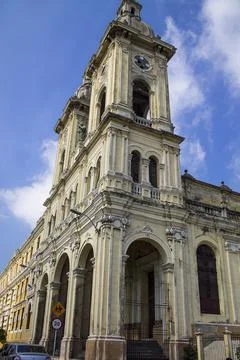 Vertical shot of an old clock tower in Colombia, Barranquilla architecture Fotos de archivo