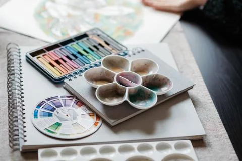 Vertical shot of painting tools on the table Stock Photos