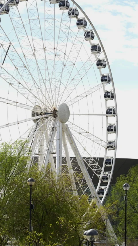 Vertical shot with partial view of ferris wheel of Liverpool. Stock Footage 304886603