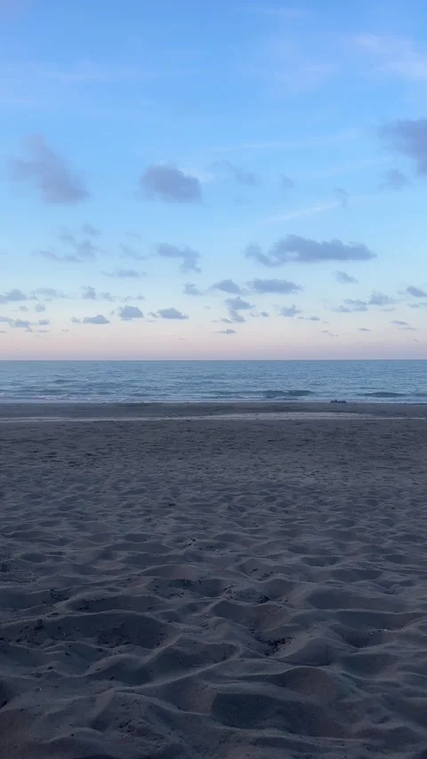Vertical shot of patterned beach and horizon with ocean audio - Nautla Veracruz Stock Footage 314976891