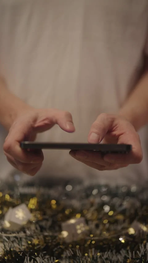Vertical shot of person alpha generation typing fast on smartphone touchscreen Stock Footage 325711833