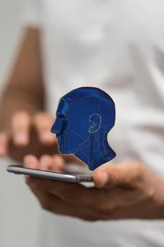Vertical shot of a person using their phone with a floating digital render of a Stock Photos
