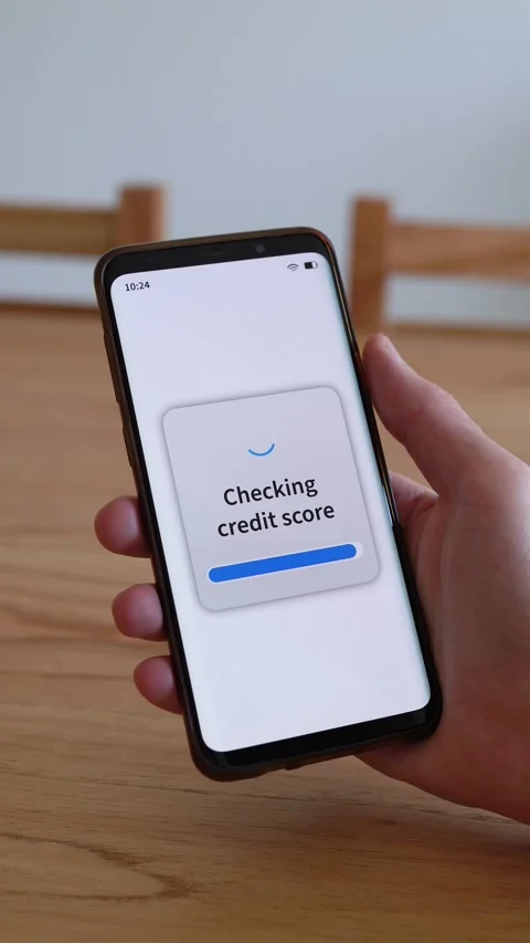 Vertical shot of phone app checking credit score for loan approval. Stock Footage 321356461