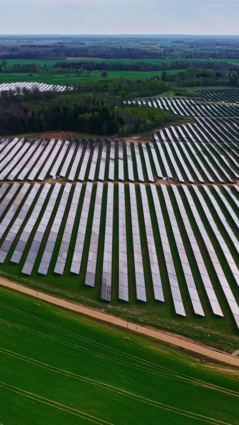 Vertical shot of photovoltaic array in clean power facility Stock Footage 336779718