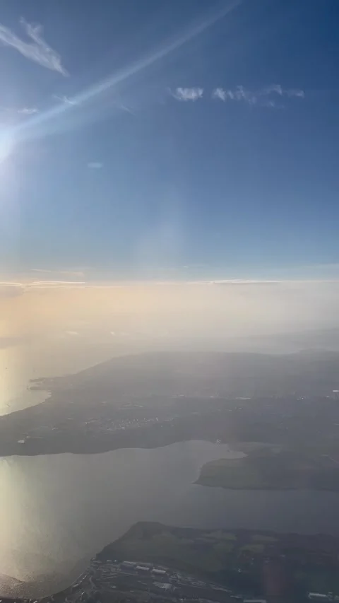 Vertical shot of plane view of land and sea Stock Footage 277289328