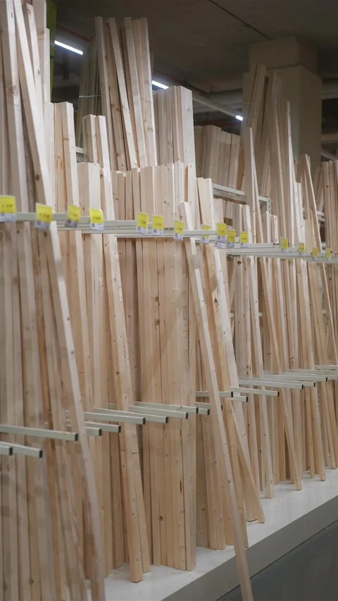 Vertical shot of planks of timber in carpentry store warehouse Stock-Footage 224894152