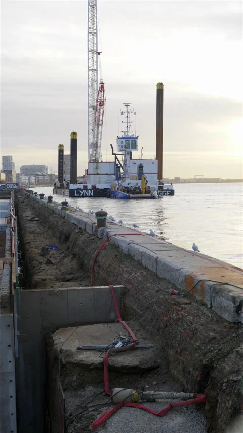 Vertical shot of Platform crane boat working on renovation of old jetty piers Видео 222073372