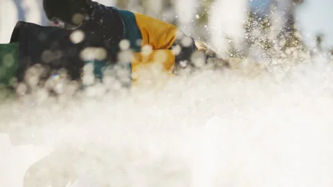 Vertical shot. Portrait of a Child Blowing on the Snow in His Hands. Childhood Stock Footage 293758174