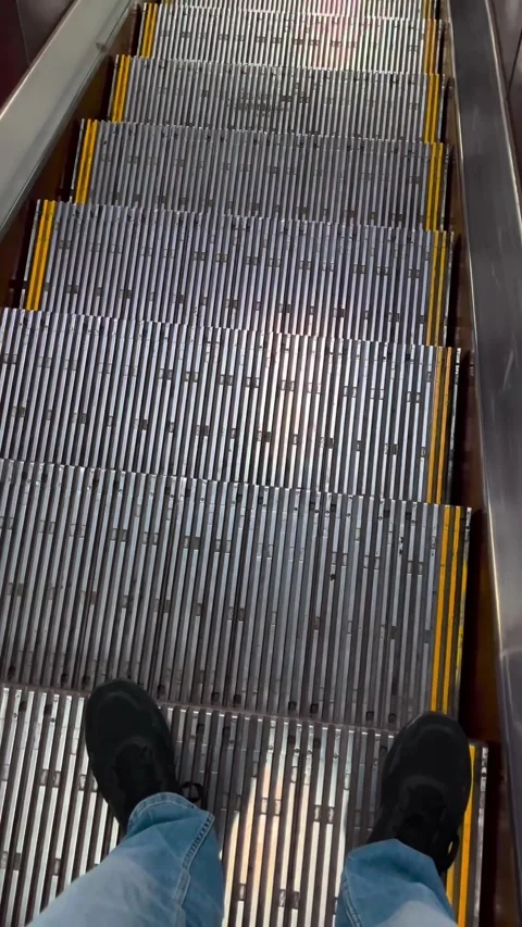 Vertical Shot. POV escalator commute for mobile ads and retail promos Stock Footage 339272575