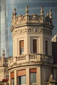 Vertical shot of a rounded building during the day in Bilbao Fotos de archivo
