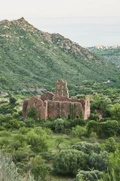 A vertical shot of the ruins of Carmelite Convent of Desierto de las Palmas,  Stock Photos