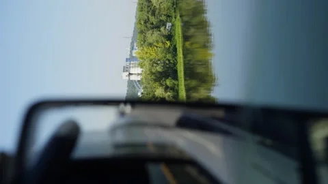 Vertical shot of scenic nature from the window of a large truck. Stock Footage 309294083