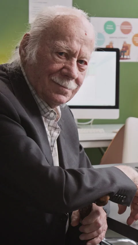Vertical Shot of Senior Man in Computer Literacy Class Stock Footage 333708566