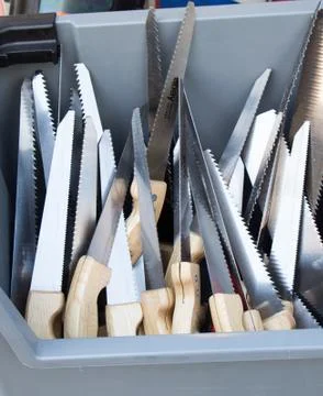 Vertical shot of sharp knives in a box Stock Photos