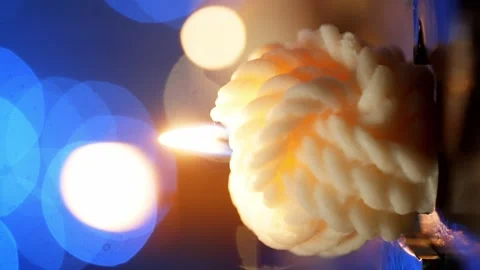 A vertical shot showing a close-up of a handmade candle. Stock Footage 269040258