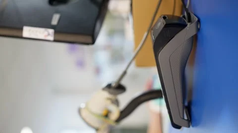 A vertical shot showing a close-up of payment through the terminal. Stock Footage 263890579
