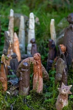 Vertical shot of small clay figures in the Shiststone town of Cadeira in Portuga Stock Photos
