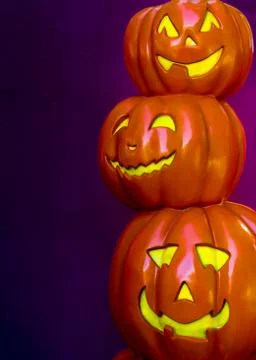 Vertical shot of stack pumpkins isolated on violet background Stock Illustration