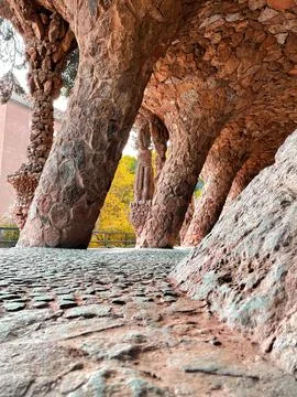 Vertical shot of stone pillars found in park Guell of Barcelona, Spain Photos