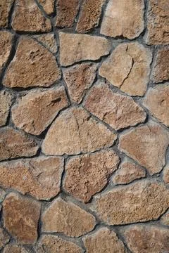 Vertical shot of stone wall texture Stock Photos