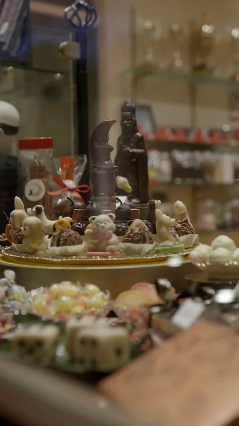 Vertical shot of sweets and chocolates in traditional chocolat shop 動画素材 222067837