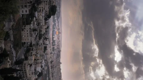 Vertical shot of Time-lapse of the city and sun rays from the BYU Jerusalem Stock Footage 54133875