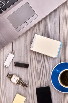Vertical shot top view flat lay office workdesk on white table. Stock Photos