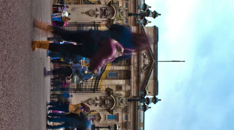 Vertical shot of Tracking time-lapse of tourists at Buckingham Palace in London. Stock Footage 54225889