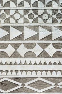 Vertical shot of traditional geometric patterns on the house in the village of P Foto stock