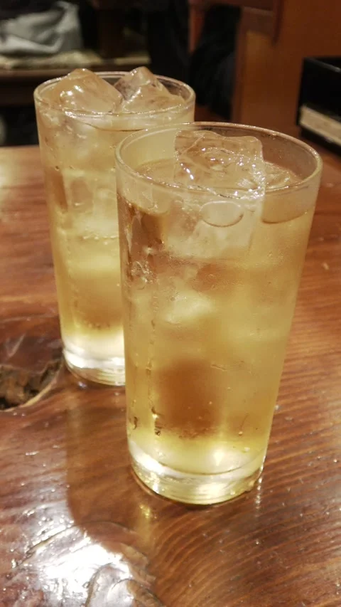 Vertical shot: Two chilled glasses of ginger ale. Stock Footage 317120448
