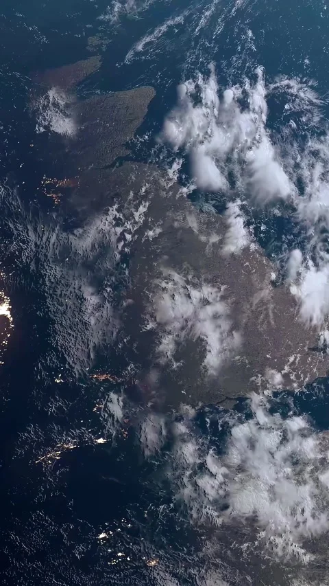 Vertical Shot of the UK Seen from Space with City Night Lights as Dawn Stock Footage 292213969