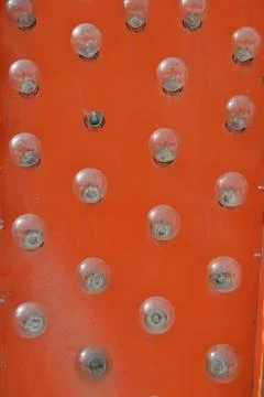 Vertical shot of vintage lights pattern with a red background Stock Photos