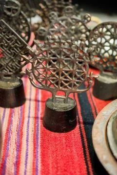Vertical shot of vintage objects on a red patterned surface Stockfoto's