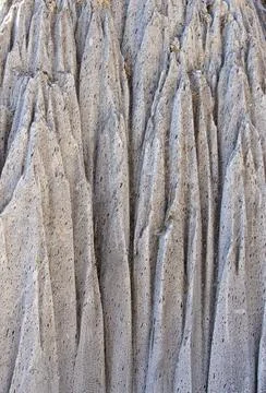 Vertical shot of a wall of eroded salt by water, in Sovata resort - Romania Stock Photos