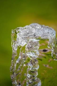 Vertical shot of water with an almost rectangular shape about to splash Stock Photos