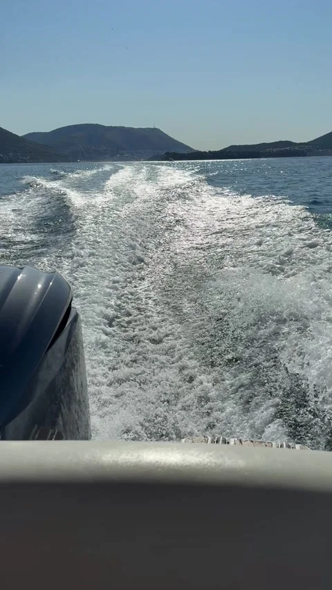 Vertical shot of waves splashing during Mediterranean boat journey Stock Footage 319407258