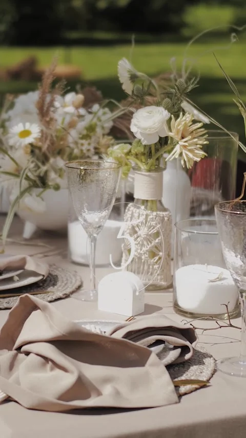 Vertical shot. Wedding decor, table decoration at an event. Table setting Video stock 308585420