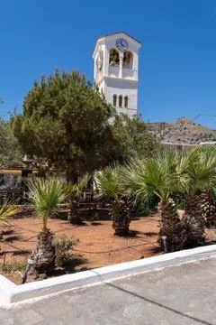 Vertical shot of the white clock tower and belfry of the Orthodox Church of.. Stock Photos