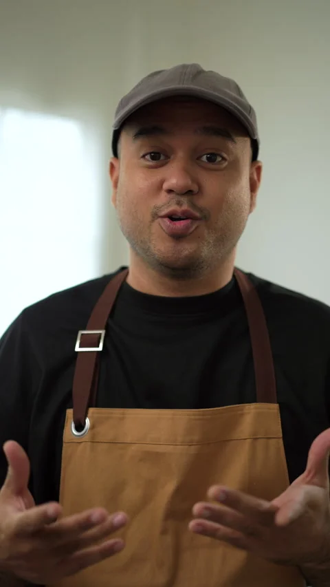Vertical shots of portrait confident bartender barista or gardener man. Stock-Footage 242478629