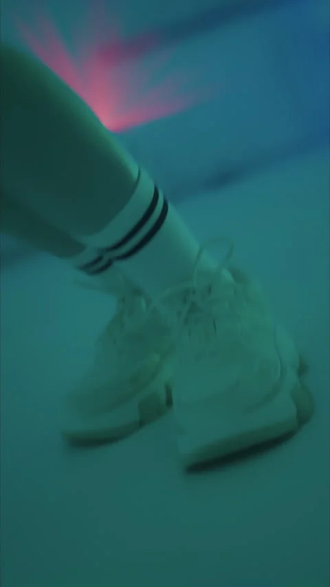 Vertical shot.slender model posing sexy on camera in studio. red baseball Vidéo 304122531