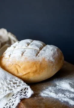 Vertical side view of an artisanal bread ,isolated on black background. Stock Photos