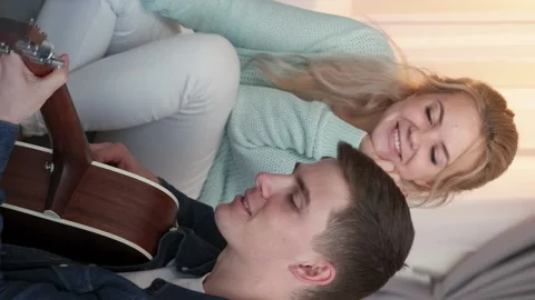Vertical singing couple romantic leisure home fun Stock Footage 231052007