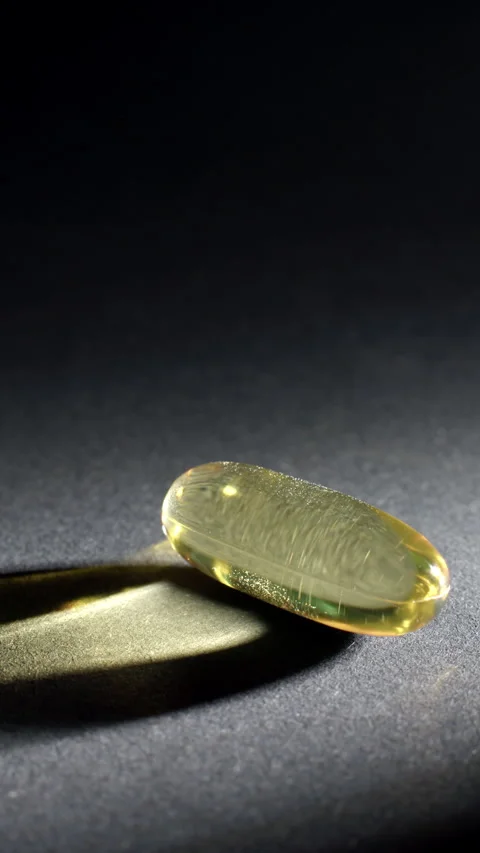 Vertical Single Omega 3 Capsule with Copy Space Video stock 332370171