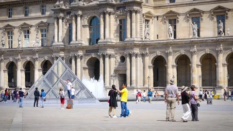 Vertical slide of the building architecture elements of Louvre museum in Paris Stock Footage 76998892