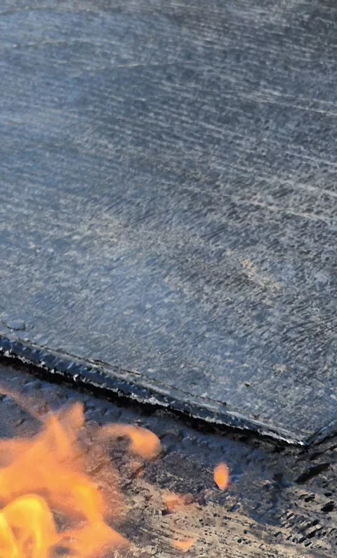 Vertical Slow Motion Bitumen Waterproofing Torch Flame Stock Footage 344431705