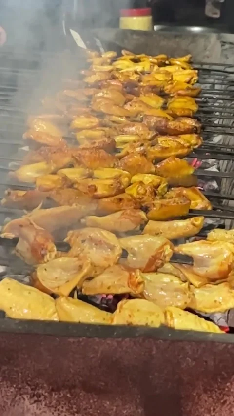 Vertical Slow Motion - Grilling on Sekh with Flames and Sizzling Meat 動画素材 300799494